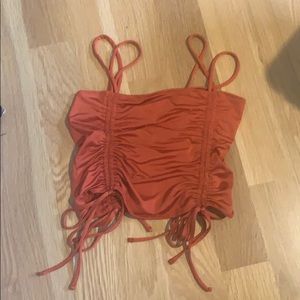 Burnt orange front and back adjustable tie crop